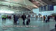 Com alguns receios, passageiros do aeroporto do Porto tomam medidas de segurança 