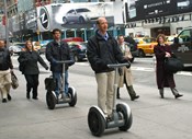 Em Novembro de 2002, durante um passeio de Segway, com o fundador do veículo motorizado