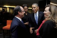 François Hollande e Barack Obama. Líderes mundiais não quiseram deixar de marcar presença no memorial a Madiba