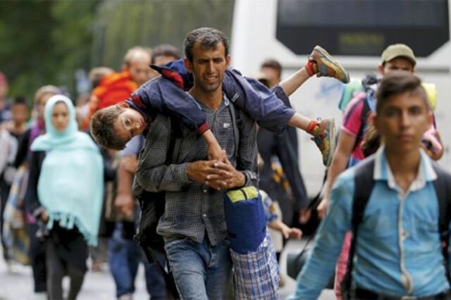 Merkel e Hollande discutem respostas à crise dos refugiados