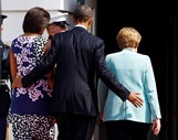 Estados Unidos, 7 de Junho de 2011. Obama entra na Casa Branca acompanhado da mulher, Michelle, e da chanceler alemã, Angela Merkel.