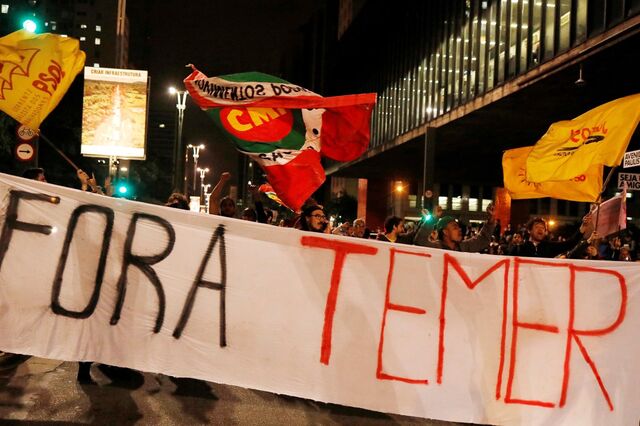 Crise política faz investidores temer e penaliza bolsas. Real afunda