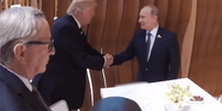 trump putin aperto mão