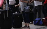 As malas que leva para a cabine podem estar a atrasar o seu avião