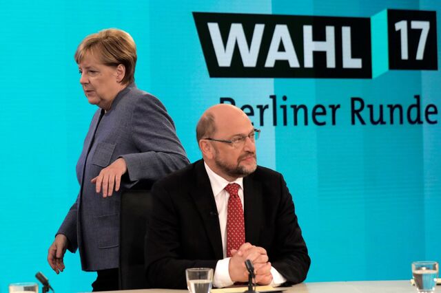 Merkel e Schulz prometem 'nova política' ao iniciarem conversações para tentar formar governo na Alemanha