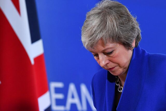 May confirma cancelamento da votação e anuncia negociações urgentes com UE