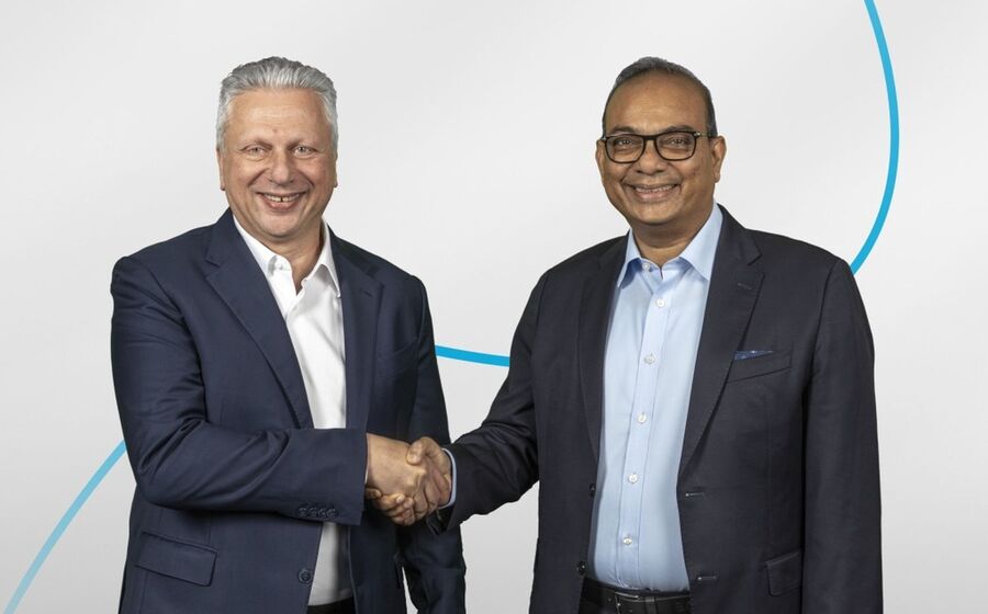 Da esquerda para a direita: Aiman Ezzat, presidente executivo da Capgemini , e Keshav R. Murugesh, presidente executivo da WNS