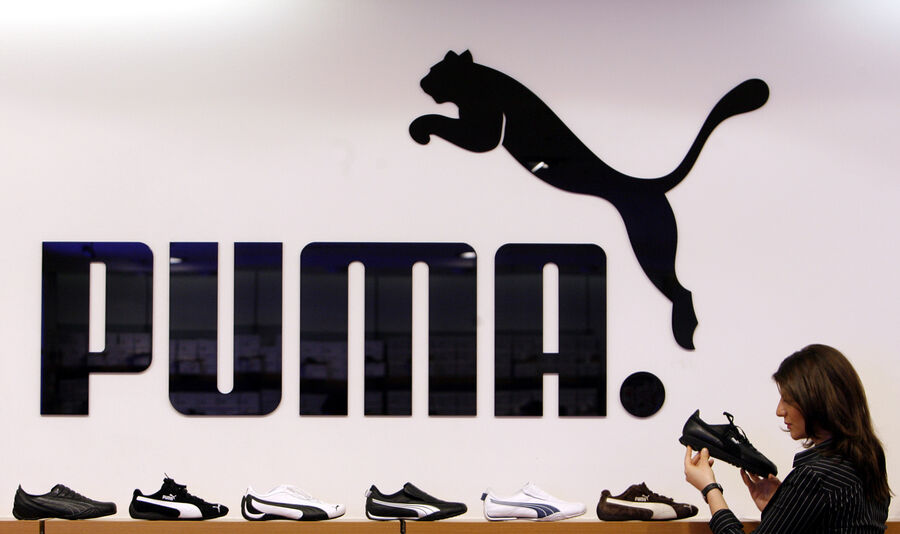 Ações da Puma disparam face a possível venda pela família Pinault