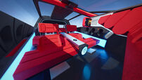 Interior futurista do Peugeot Polygon Concept com detalhes em vermelho e azul