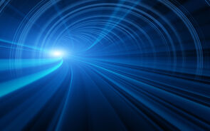 Um túnel de luz azul representa o futuro da mobilidade elétrica e híbrida em 2026